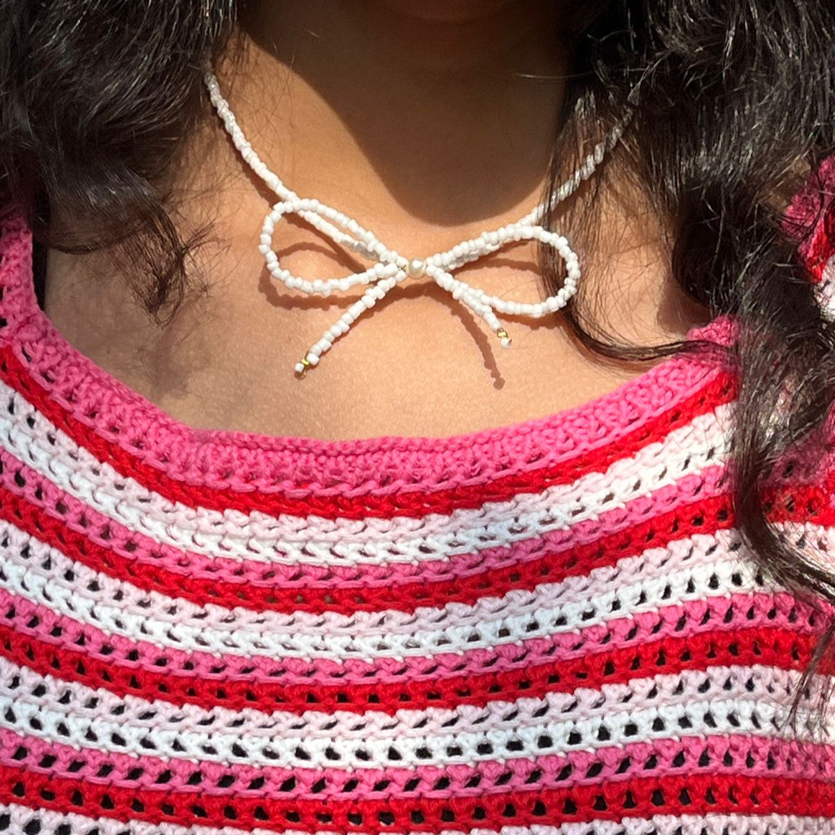 Ivory Charm Bow Beaded Necklace